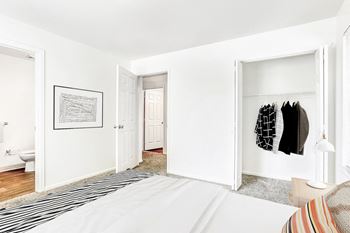 Bedroom with walk-in closet and adjoining bathroom